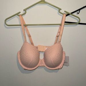 Never worn pink cheetah print bra with tags 34D